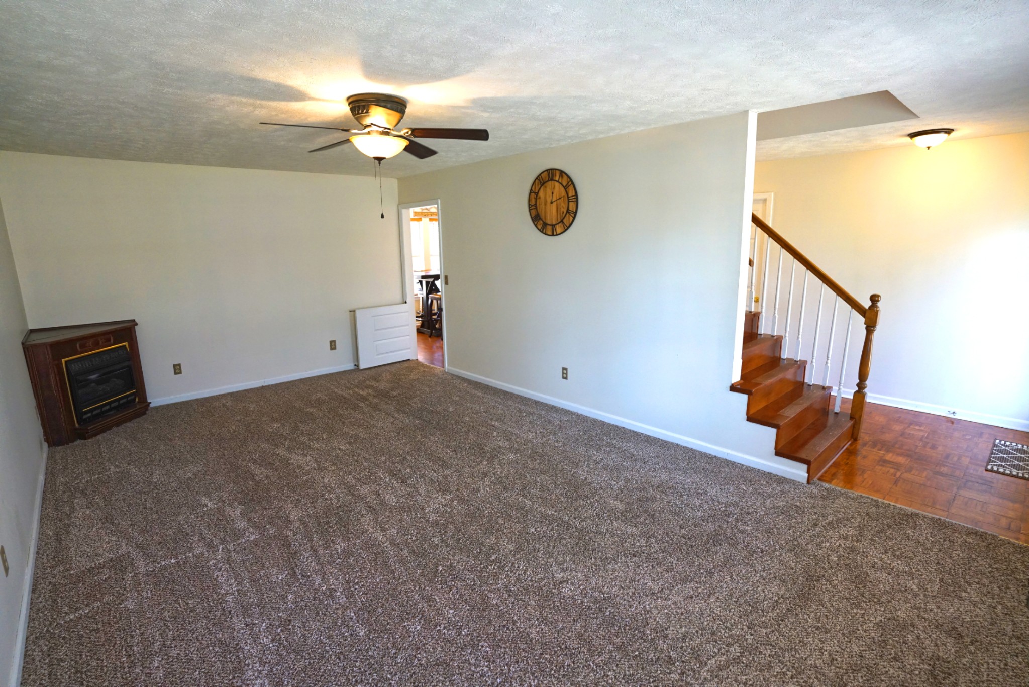 1168 West Grab Creek Road Dickson, TN 37055 - Photo 7 of 37 a view of a livingroom with a staircase