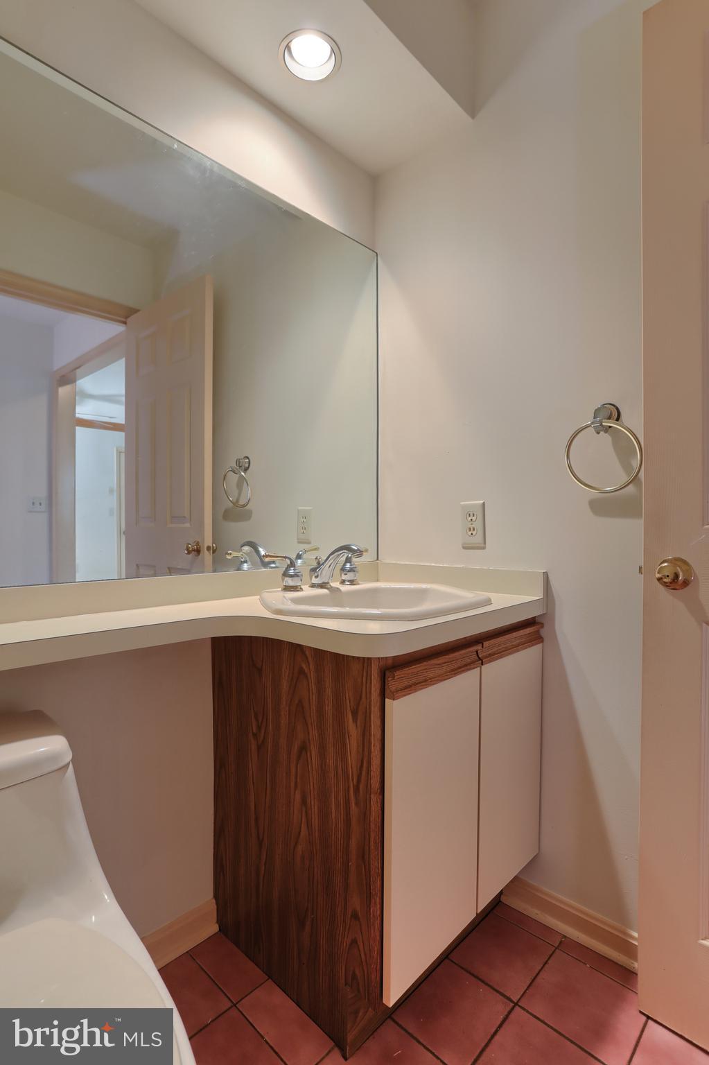 77 Cambridge Drive Hershey, PA 17033 - Photo 17 of 33 Main level half bath off of hallway in foyer