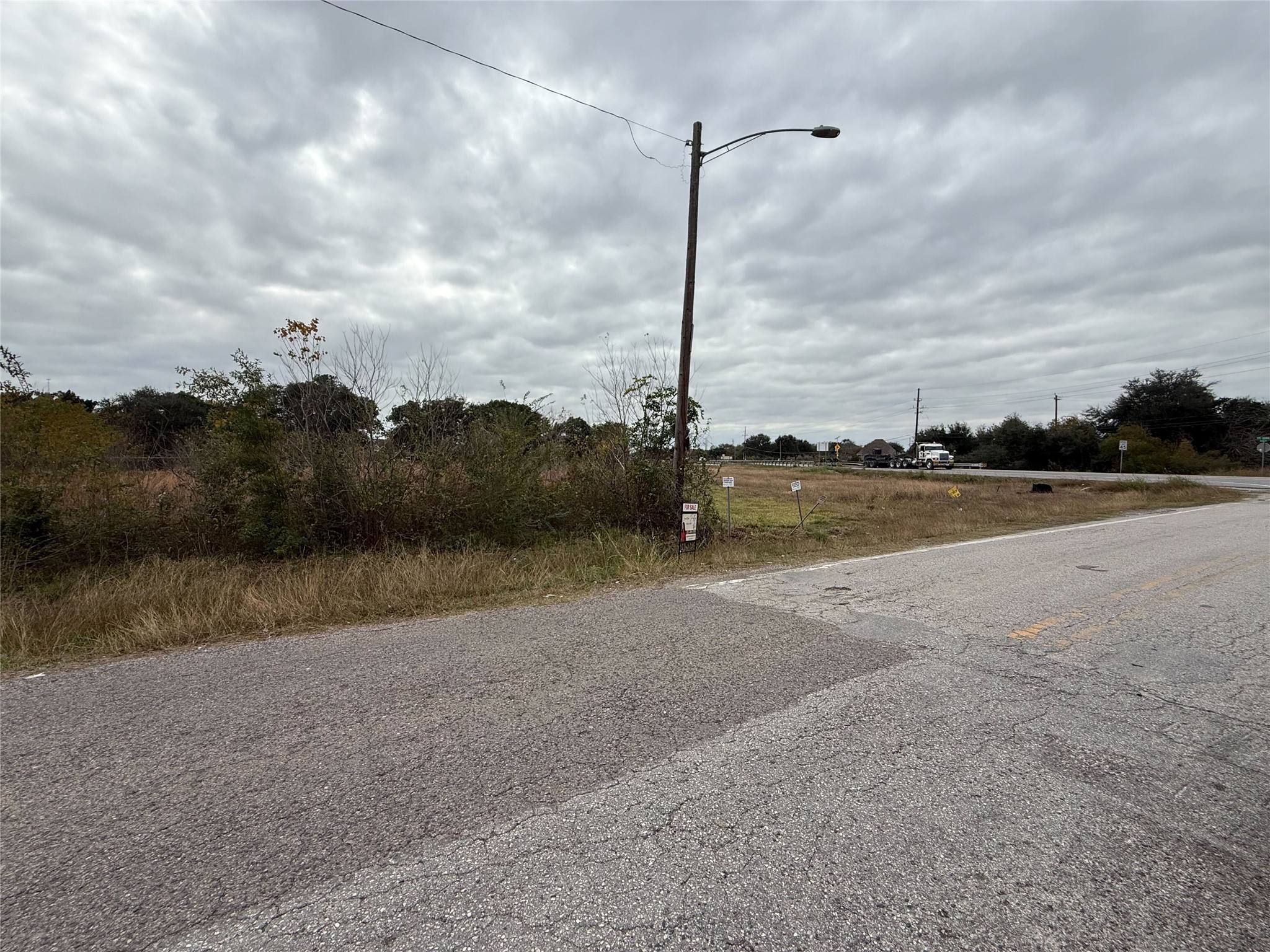 9015 Schiro Road Hitchcock, TX 77563 - Photo 6 of 9 a view of lake with mountain