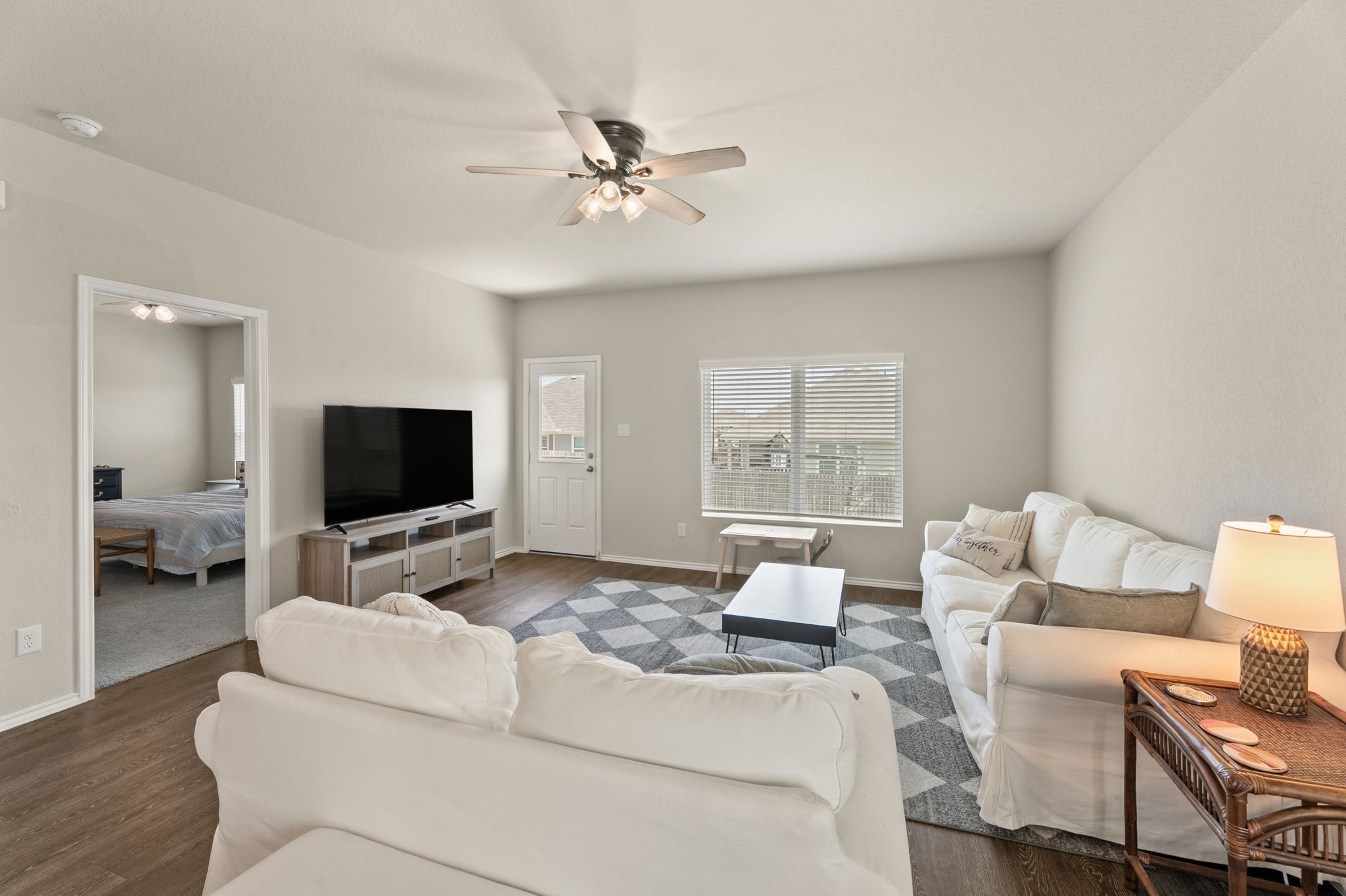 3969 Legend Ranch New Braunfels, TX 78130 - Photo 13 of 32 a living room with furniture and a flat screen tv