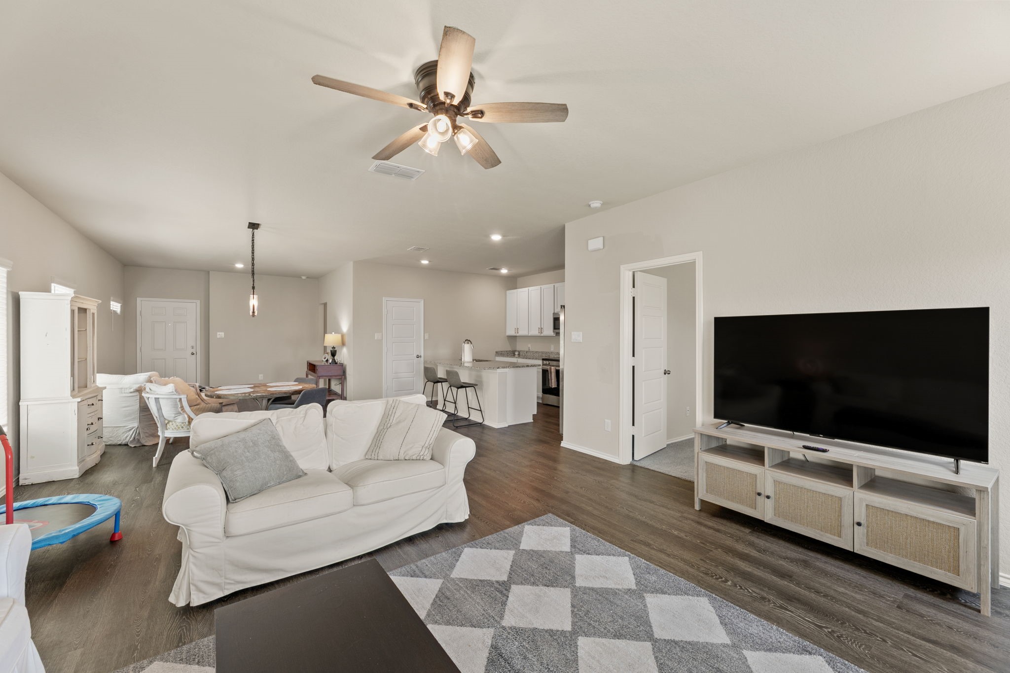 3969 Legend Ranch New Braunfels, TX 78130 - Photo 15 of 32 a living room with furniture and a flat screen tv