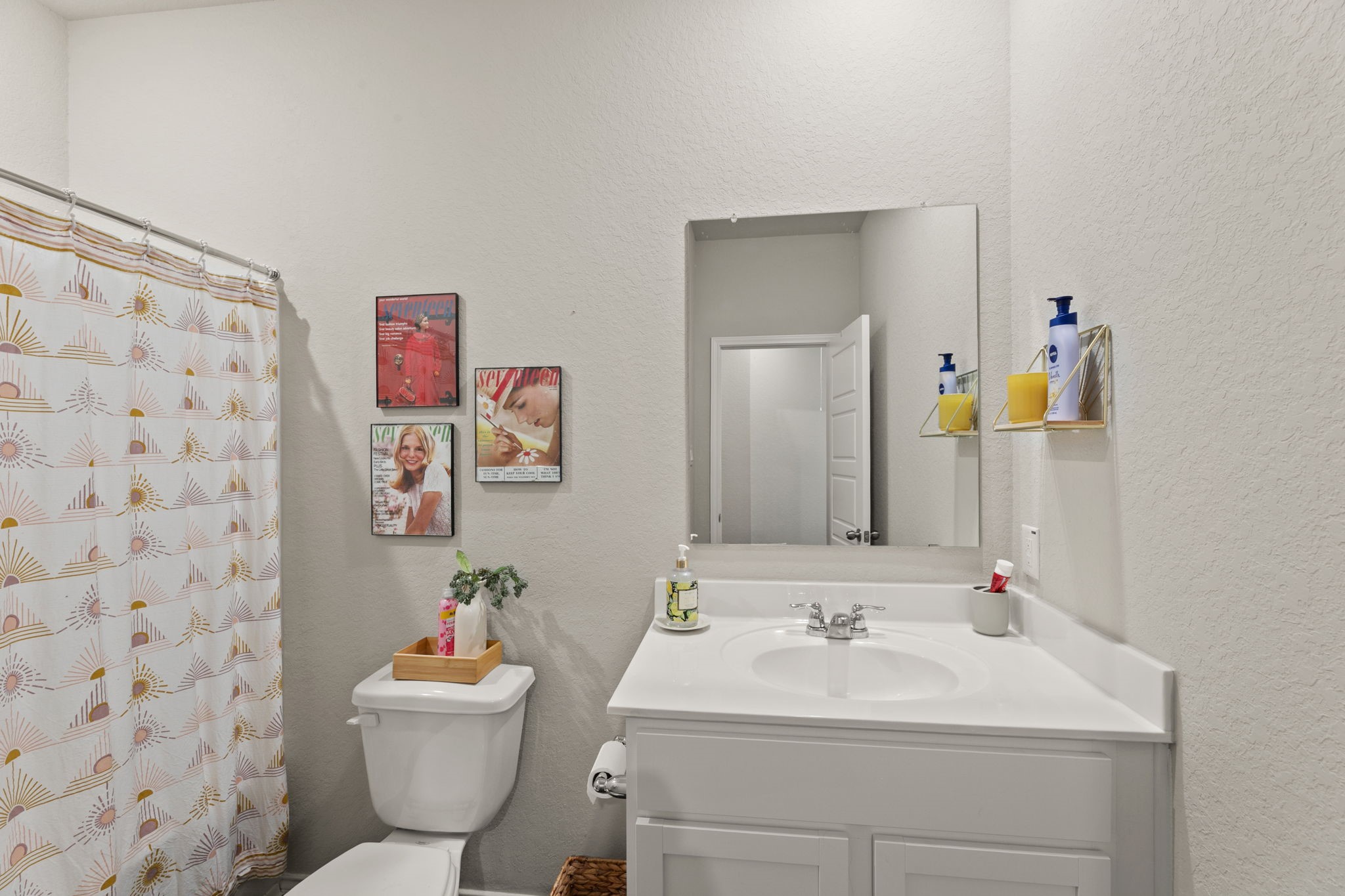 3969 Legend Ranch New Braunfels, TX 78130 - Photo 25 of 32 a bathroom with a sink and a mirror