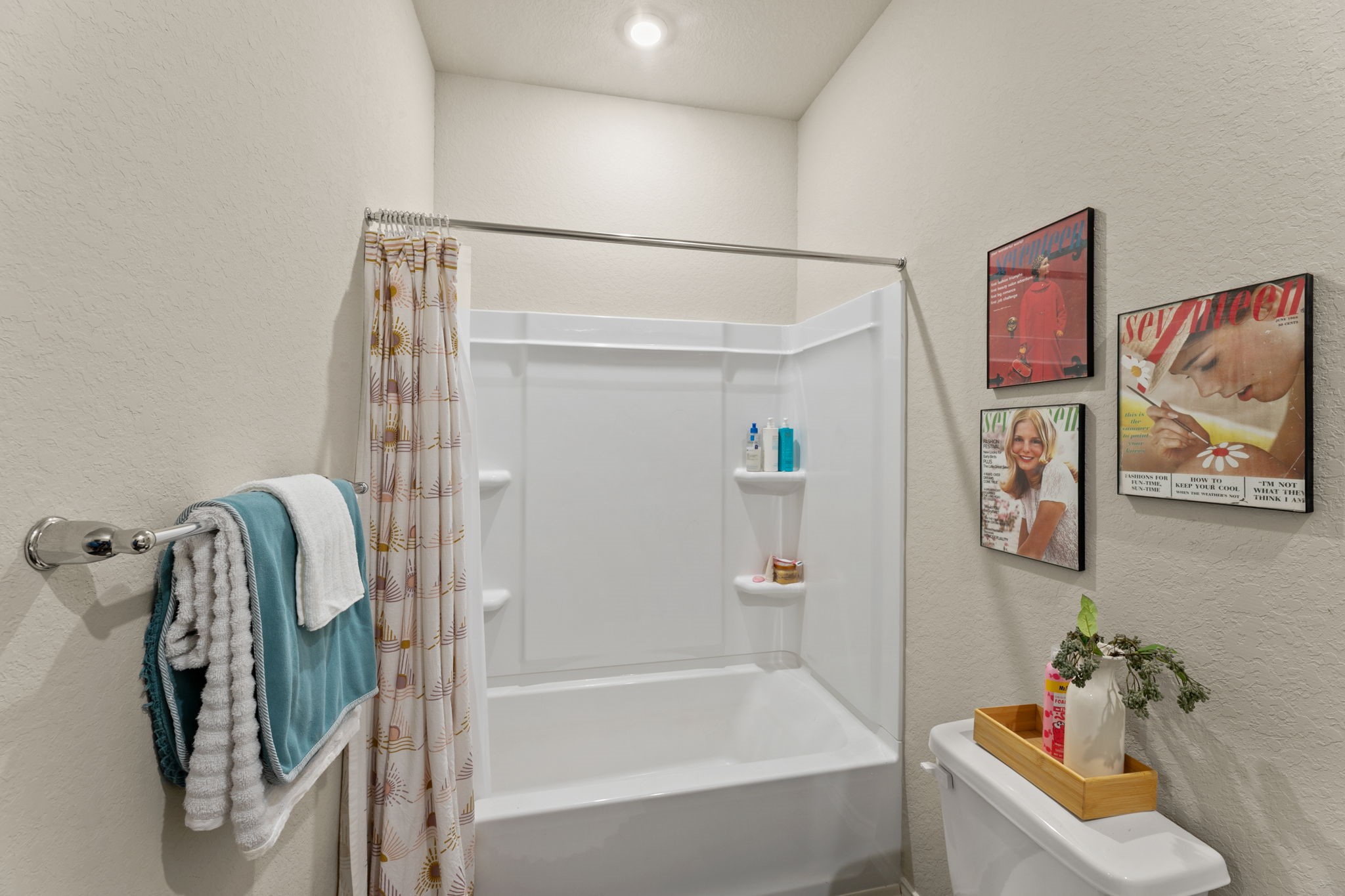 3969 Legend Ranch New Braunfels, TX 78130 - Photo 27 of 32 a bathroom with a bathtub and shower