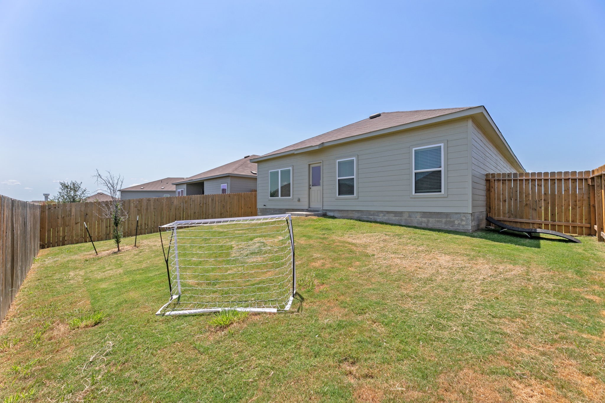 3969 Legend Ranch New Braunfels, TX 78130 - Photo 32 of 32 a house view with a backyard space