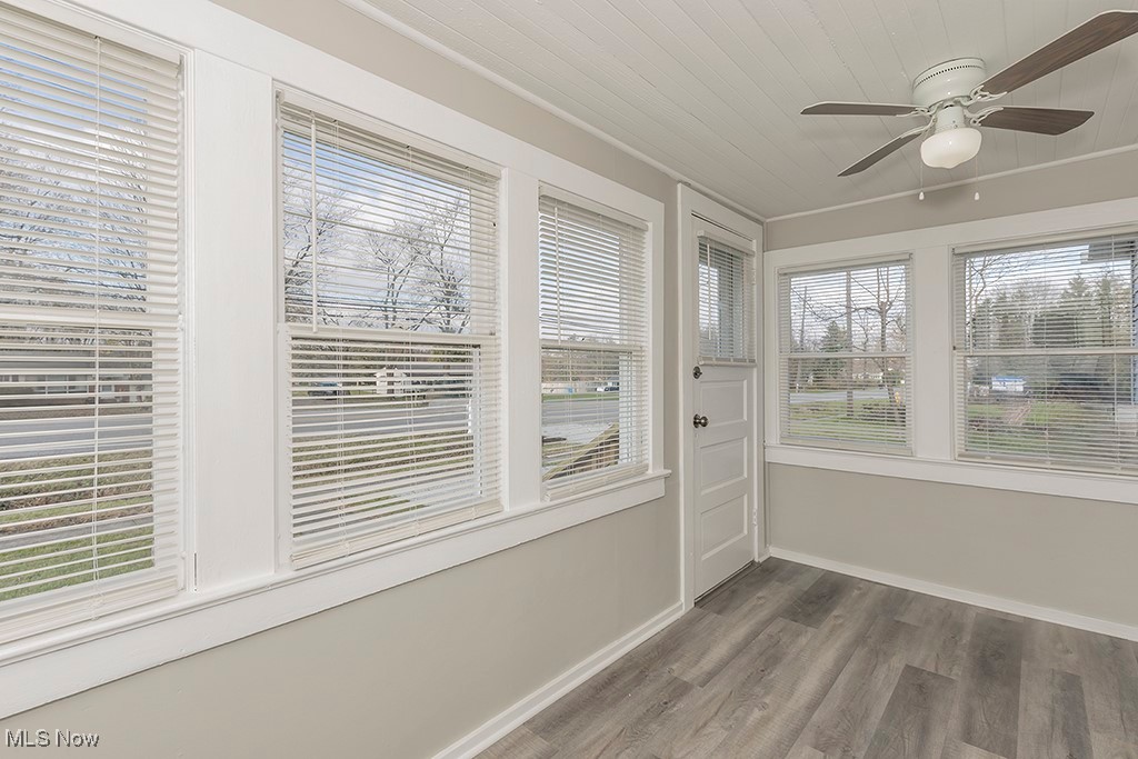 12447 Chillicothe Road Chesterland, OH 44026 - Photo 31 of 42 Unfurnished sunroom featuring ceiling fan