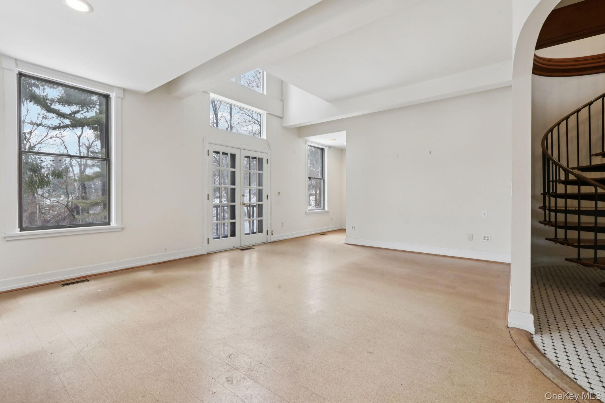 32 East Lake Stable Road Tuxedo Park, NY 10987 - Photo 17 of 49 a view of an empty room with a window