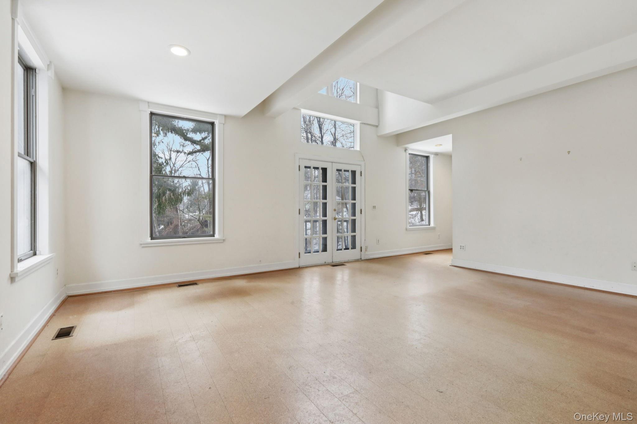 32 East Lake Stable Road Tuxedo Park, NY 10987 - Photo 18 of 49 a view of an empty room with a window