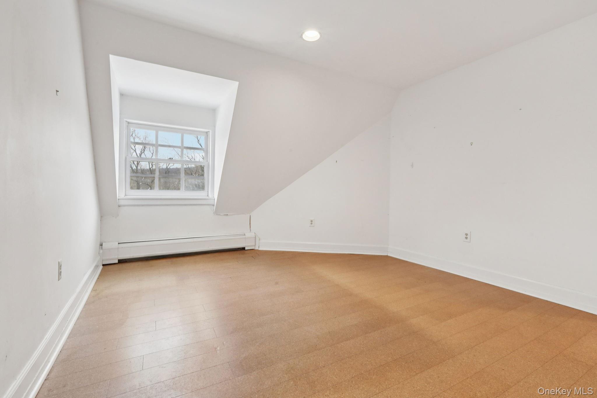 32 East Lake Stable Road Tuxedo Park, NY 10987 - Photo 30 of 49 an empty room with a window