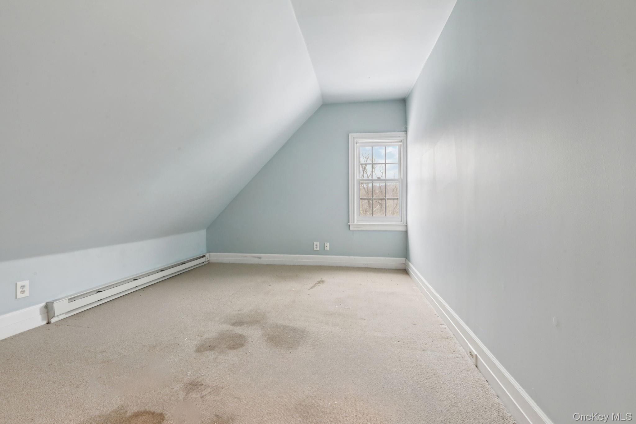 32 East Lake Stable Road Tuxedo Park, NY 10987 - Photo 37 of 49 an empty room with a window