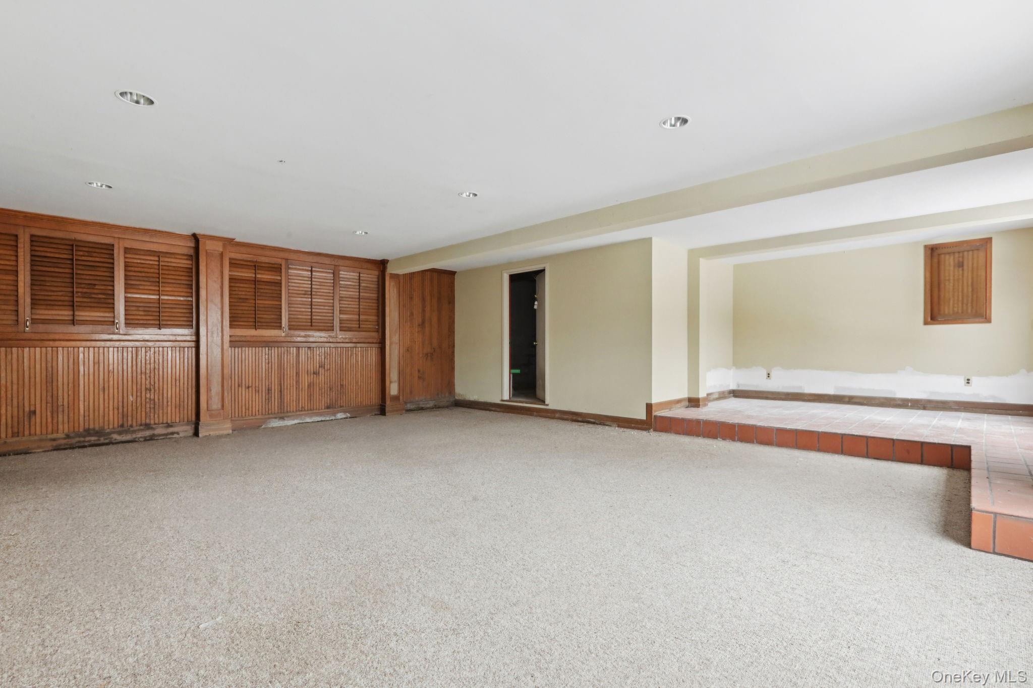 32 East Lake Stable Road Tuxedo Park, NY 10987 - Photo 40 of 49 a view of an empty room with a window