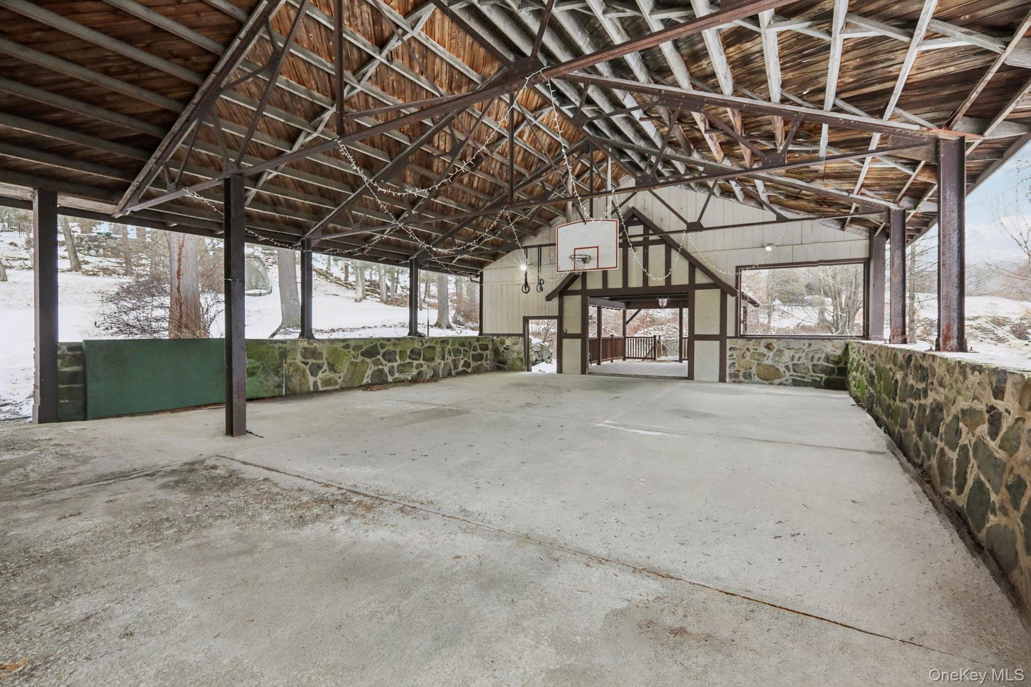 32 East Lake Stable Road Tuxedo Park, NY 10987 - Photo 42 of 49 a view of a shaded area of a house