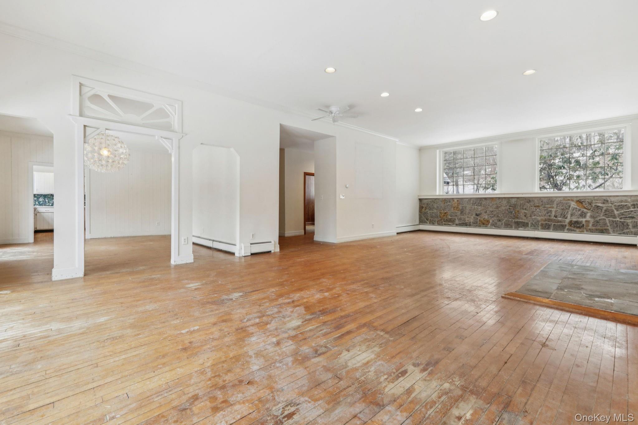 32 East Lake Stable Road Tuxedo Park, NY 10987 - Photo 8 of 49 a view of empty room with wooden floor