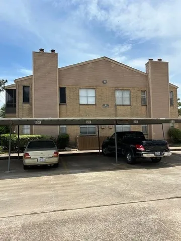 a car parked in front of a building