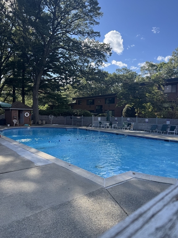 1321 Worcester Road, Unit 603 Framingham, MA 01701 - Photo 19 of 23 a view of a swimming pool with an outdoor space
