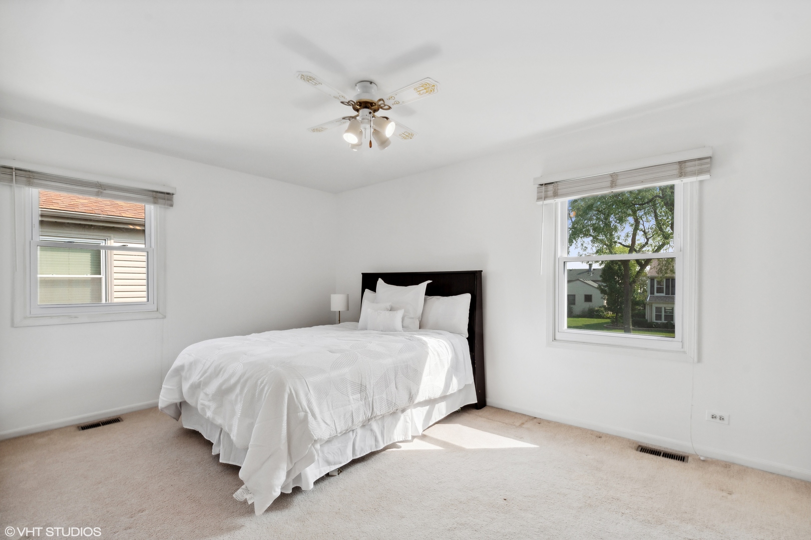 1331 Devonshire Road Buffalo Grove, IL 60089 - Photo 11 of 15 a bedroom with a bed and a window