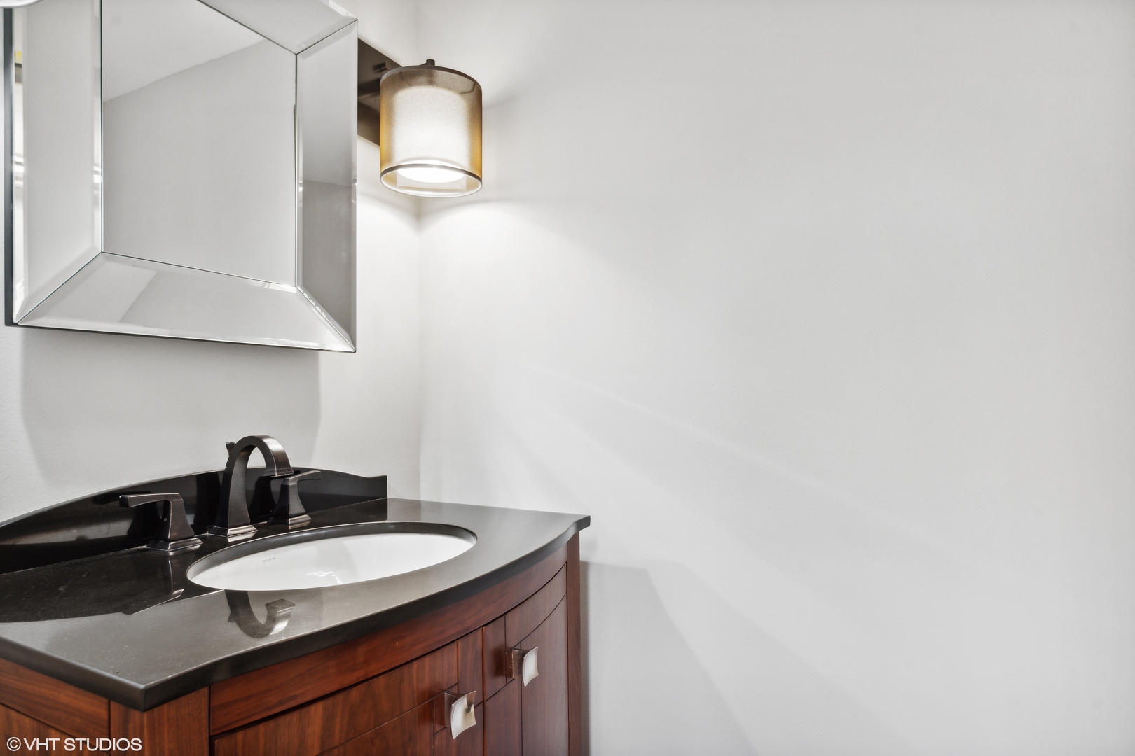 1331 Devonshire Road Buffalo Grove, IL 60089 - Photo 7 of 15 a bathroom with a sink and a mirror