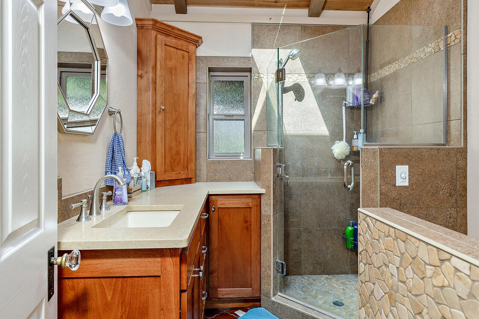 4756 Fern Valley Road Medford, OR 97504 - Photo 22 of 89 a bathroom with a sink and a mirror