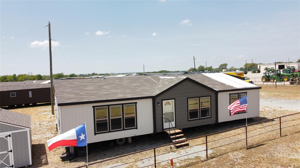 1142 Caroline Court Howe, TX 75459 - Photo 1 of 1 a aerial view of a house with a terrace space