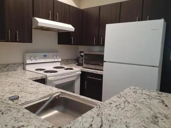 $1,690 | 911 Lyons Road, Unit 2207, Coconut Creek, FL 33063