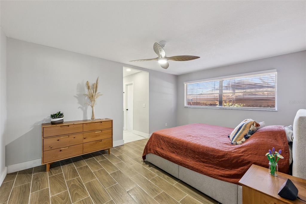 549 Iris Street Altamonte Springs, FL 32714 - Photo 15 of 28 a bedroom with a bed and window