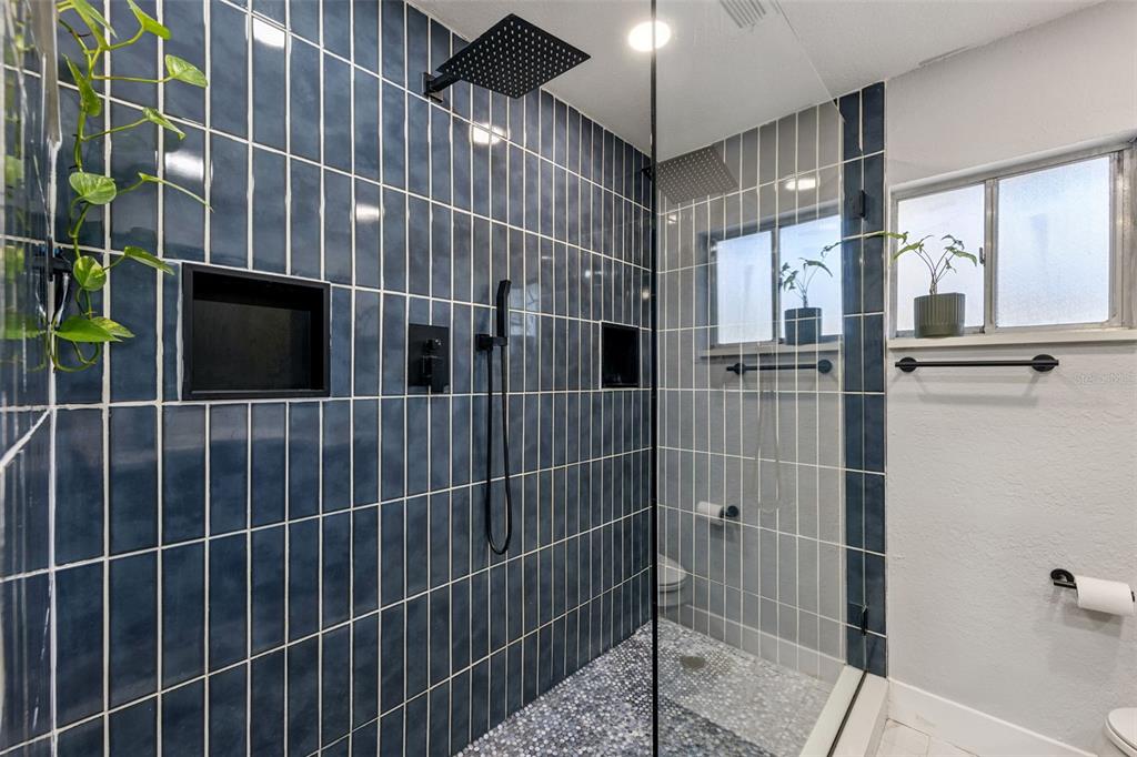 549 Iris Street Altamonte Springs, FL 32714 - Photo 16 of 28 a bathroom with a shower