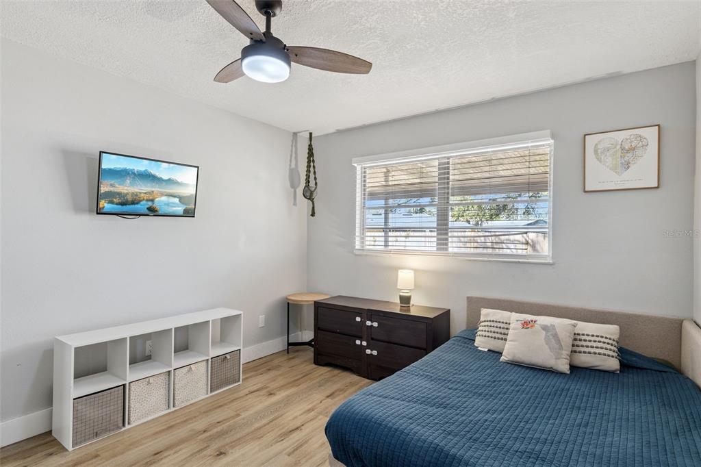 549 Iris Street Altamonte Springs, FL 32714 - Photo 18 of 28 a bedroom with a bed and a window