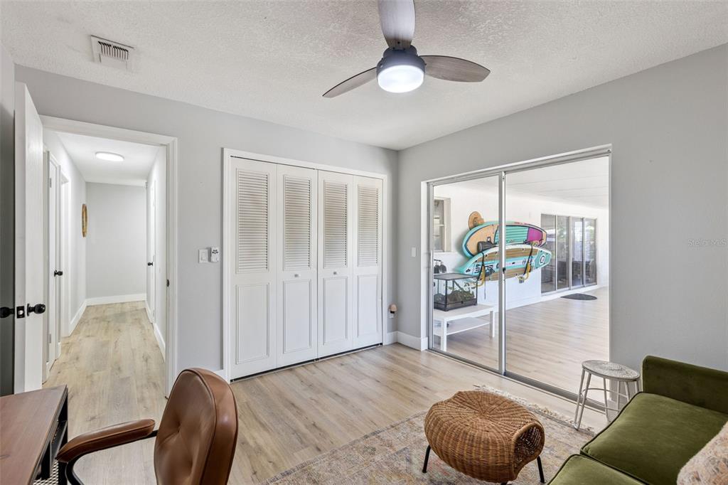 549 Iris Street Altamonte Springs, FL 32714 - Photo 22 of 28 a bedroom with furniture and a window