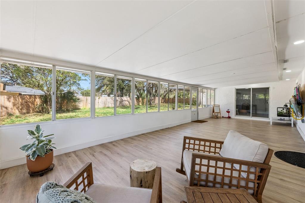549 Iris Street Altamonte Springs, FL 32714 - Photo 24 of 28 a living room with furniture and a large window