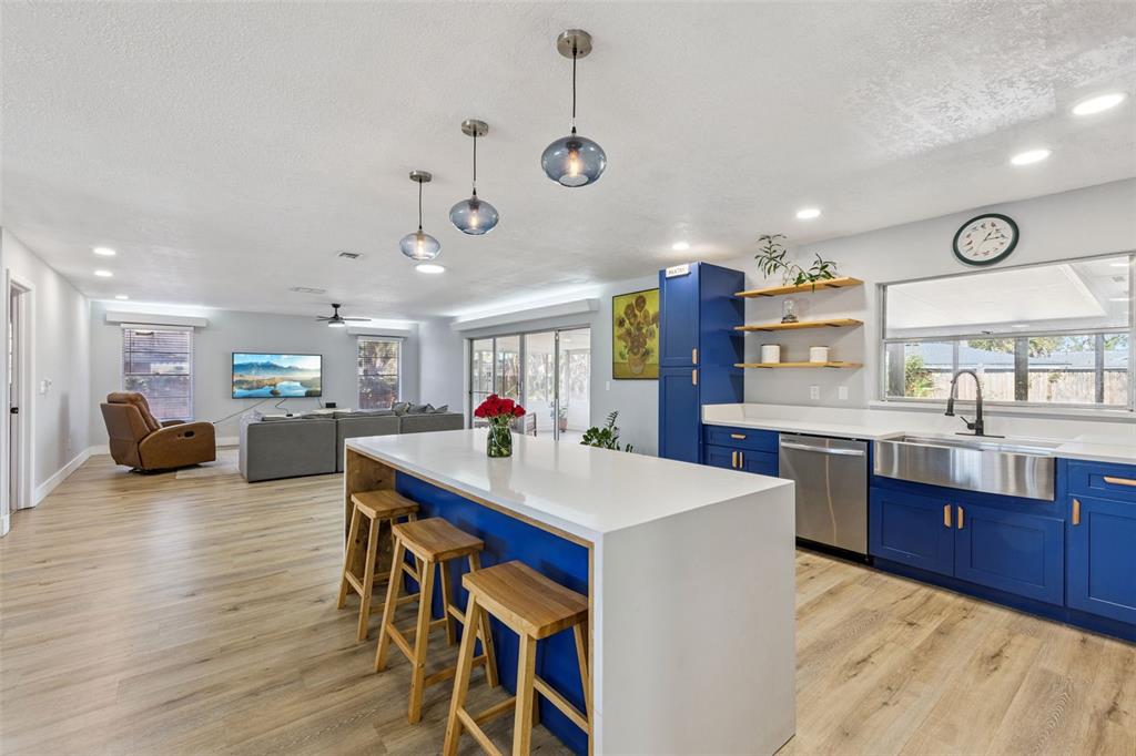 549 Iris Street Altamonte Springs, FL 32714 - Photo 9 of 28 a large kitchen with a table and chairs