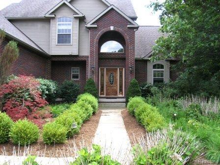 2223 Sundance Ridge Howell, MI 48843 - Photo 26 of 34 Exterior Front-Summer-2.jpg