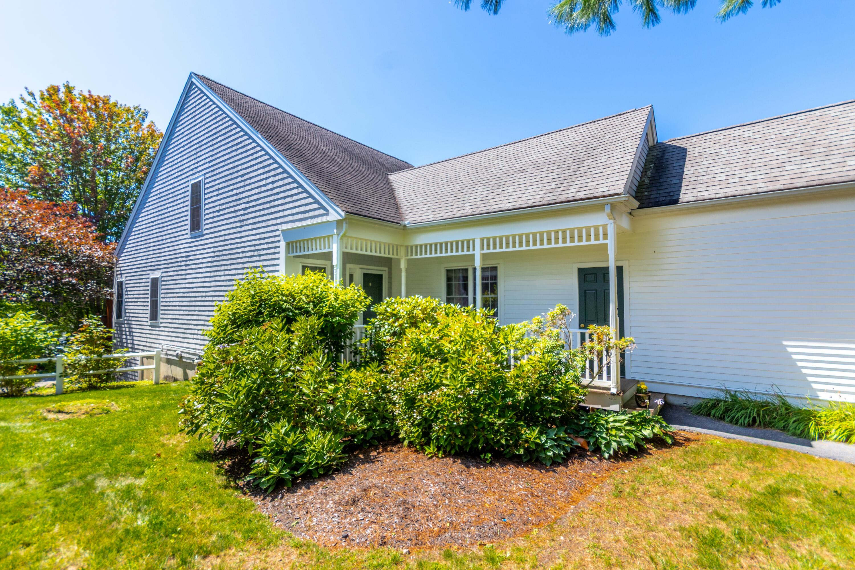 26 Carnoustie Road Bourne, MA 02532 - Photo 35 of 46 a front view of a house with a yard
