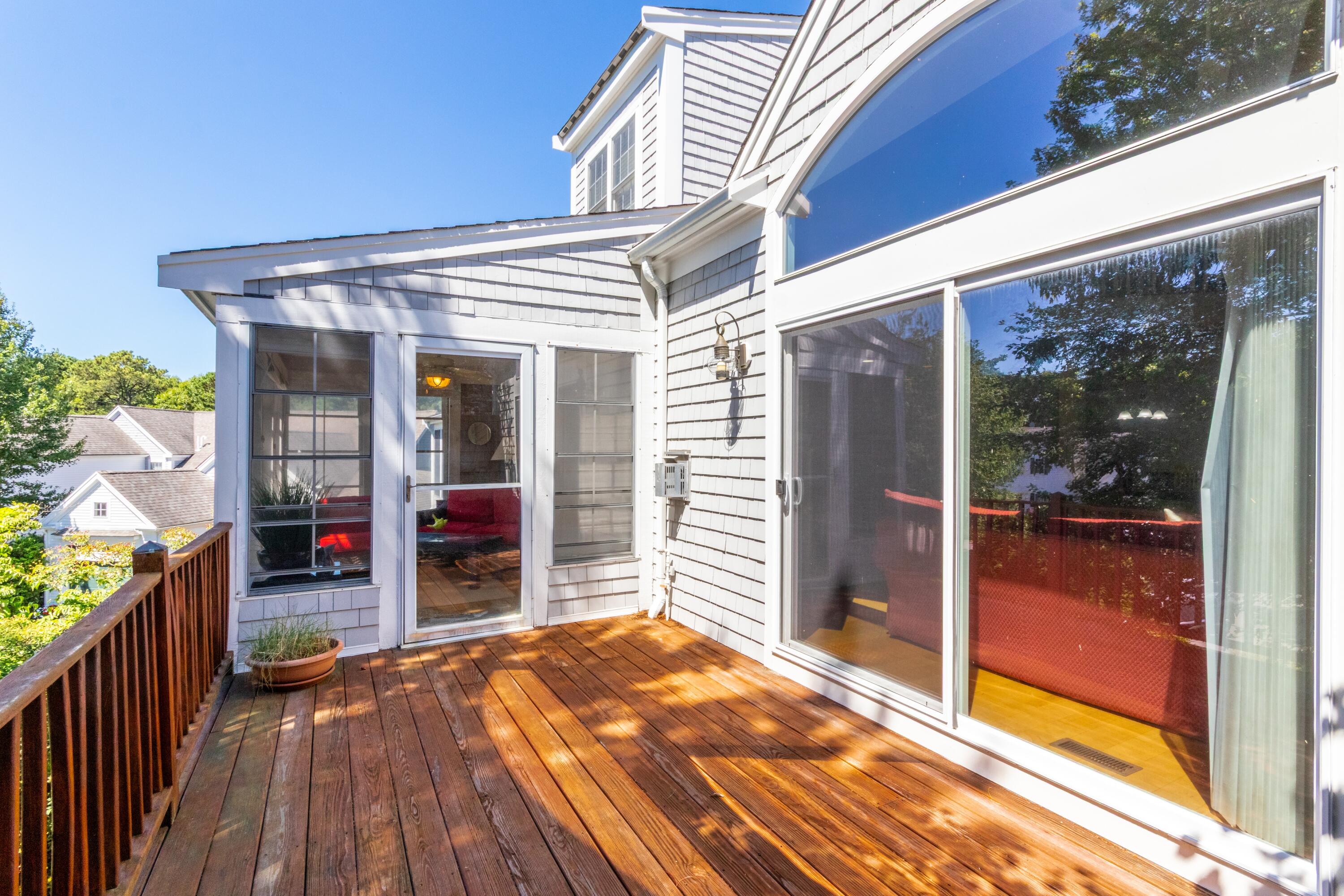 26 Carnoustie Road Bourne, MA 02532 - Photo 36 of 46 a view of a porch with wooden floor and outdoor space