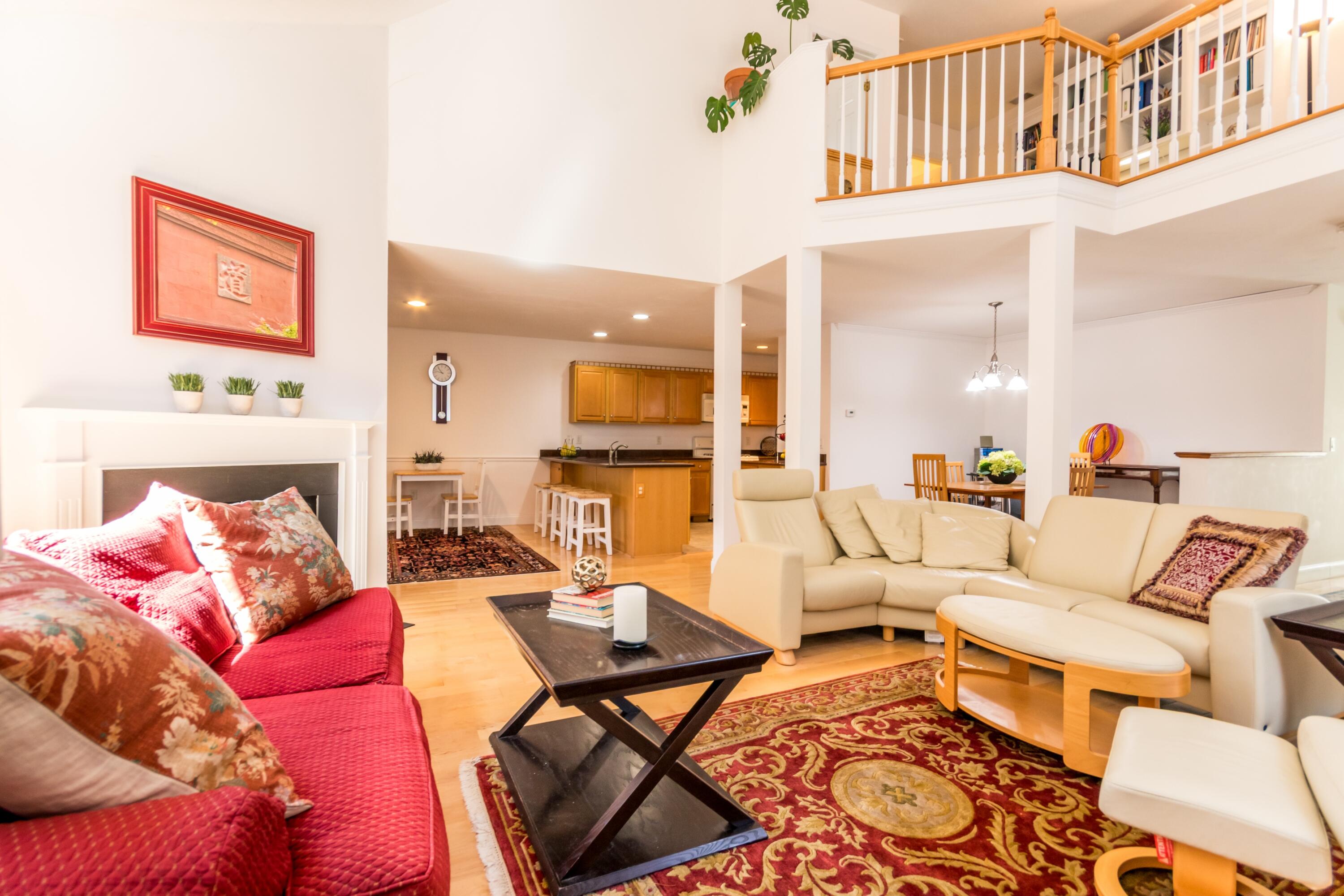 26 Carnoustie Road Bourne, MA 02532 - Photo 9 of 46 a living room with furniture wooden floor and a table