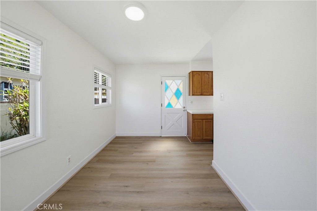 368 East 231st Street Carson, CA 90745 - Photo 15 of 46 Dining Area with new vinyl flooring. Beautiful Back door leads out to large back yard
