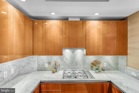 a living room with furniture and large window