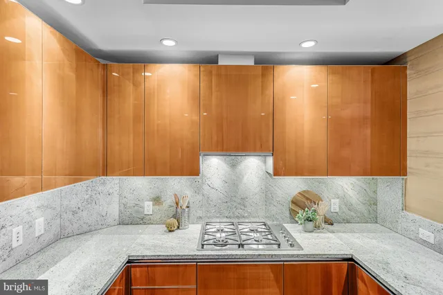 a living room with furniture and large window