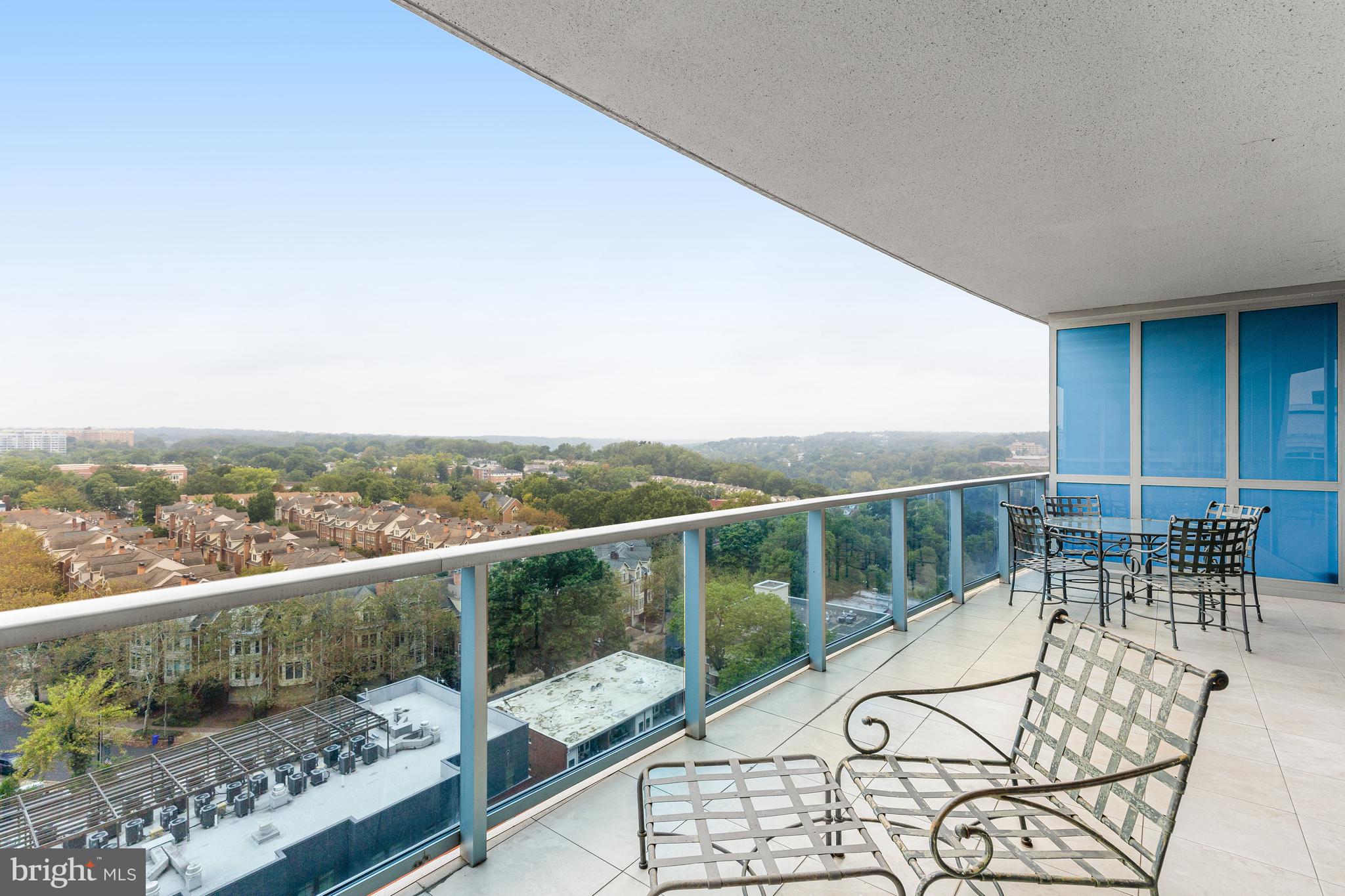 1881 North Nash Street, Unit 1706 Arlington, VA 22209 - Photo 20 of 50 a view of a balcony with lake view and a floor to ceiling window