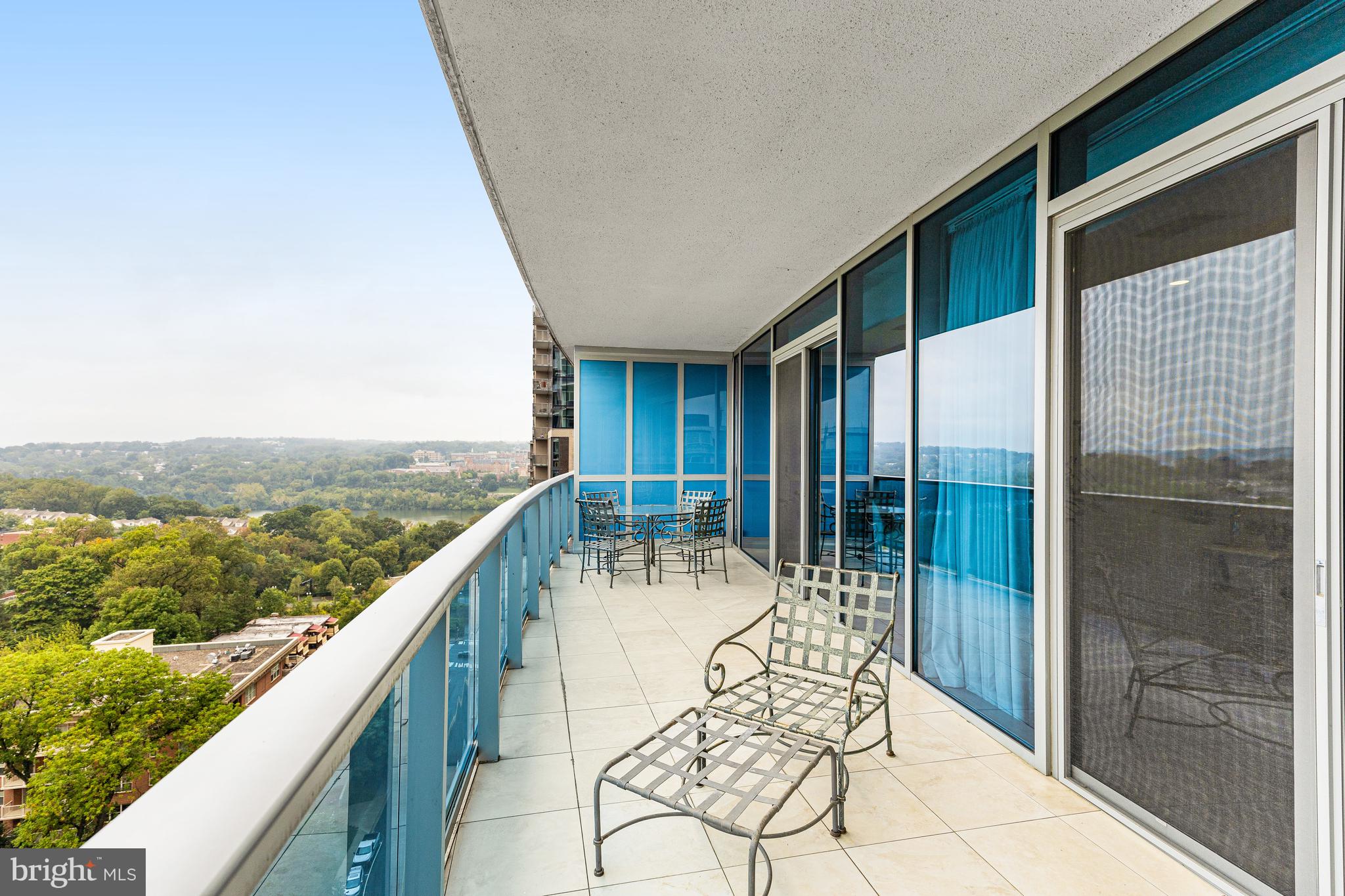 1881 North Nash Street, Unit 1706 Arlington, VA 22209 - Photo 22 of 50 a balcony with furniture and city view
