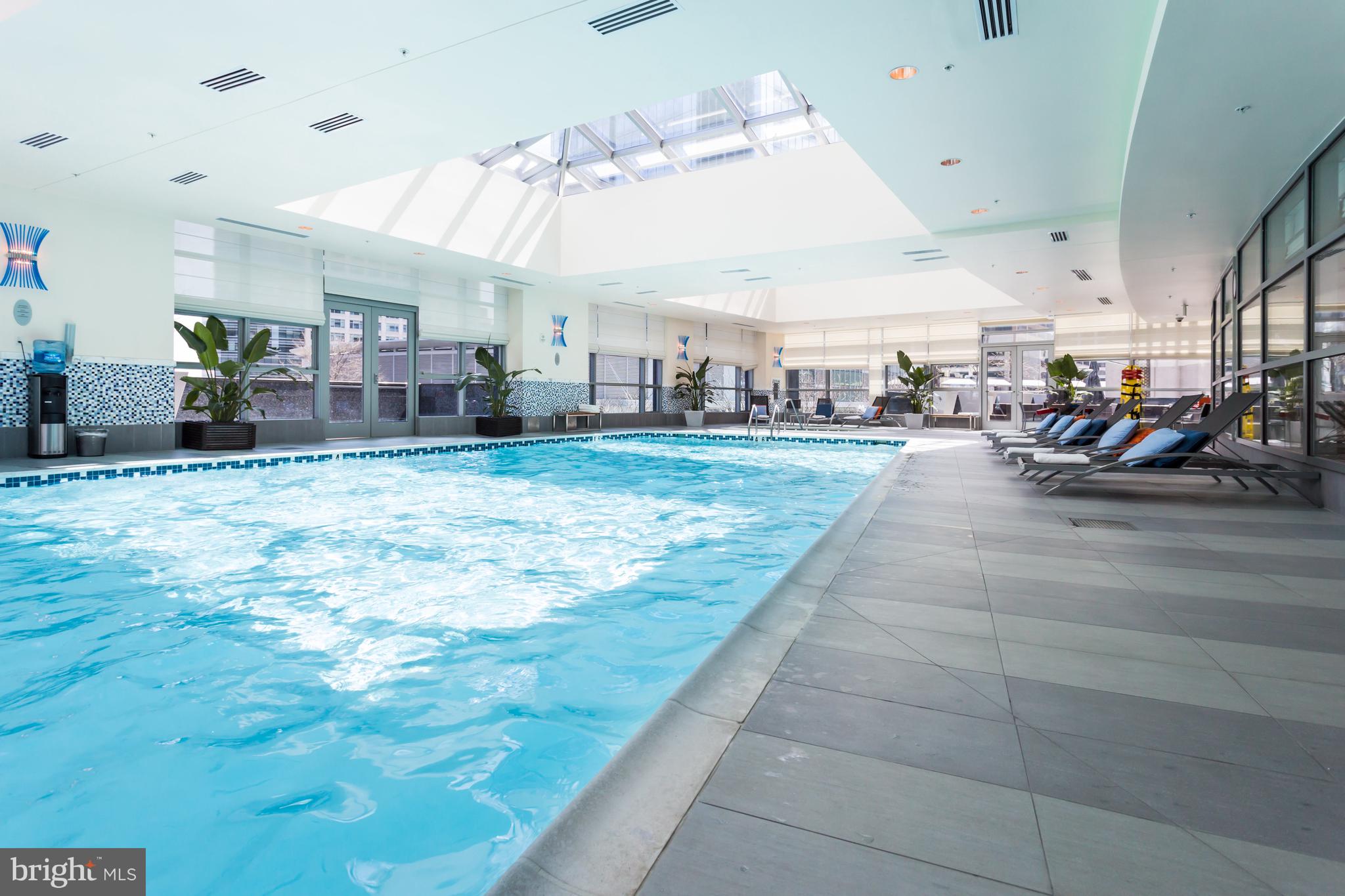 1881 North Nash Street, Unit 1706 Arlington, VA 22209 - Photo 29 of 50 a view of a living room and a kitchen