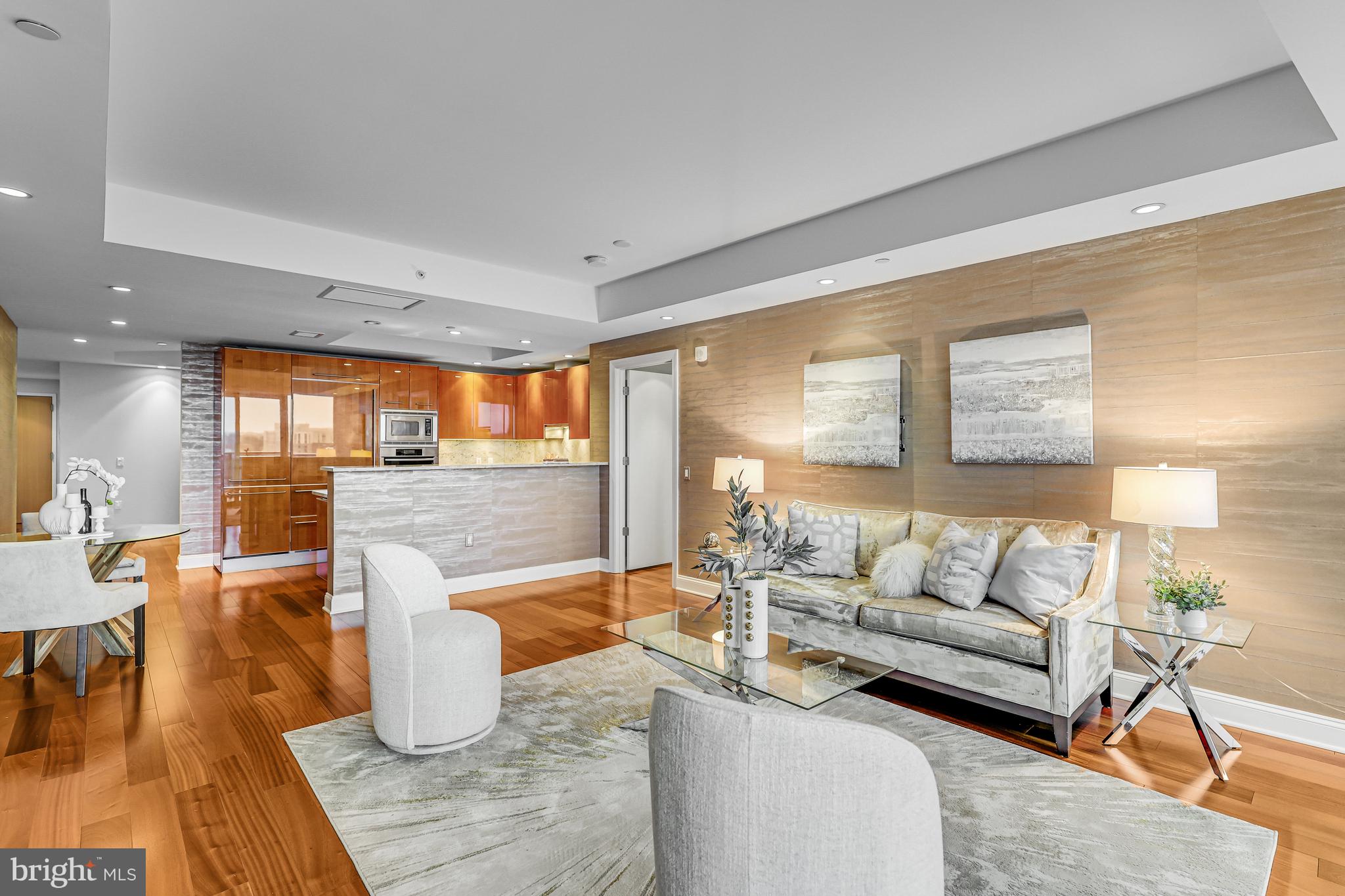 1881 North Nash Street, Unit 1706 Arlington, VA 22209 - Photo 3 of 50 a living room with furniture and wooden floor