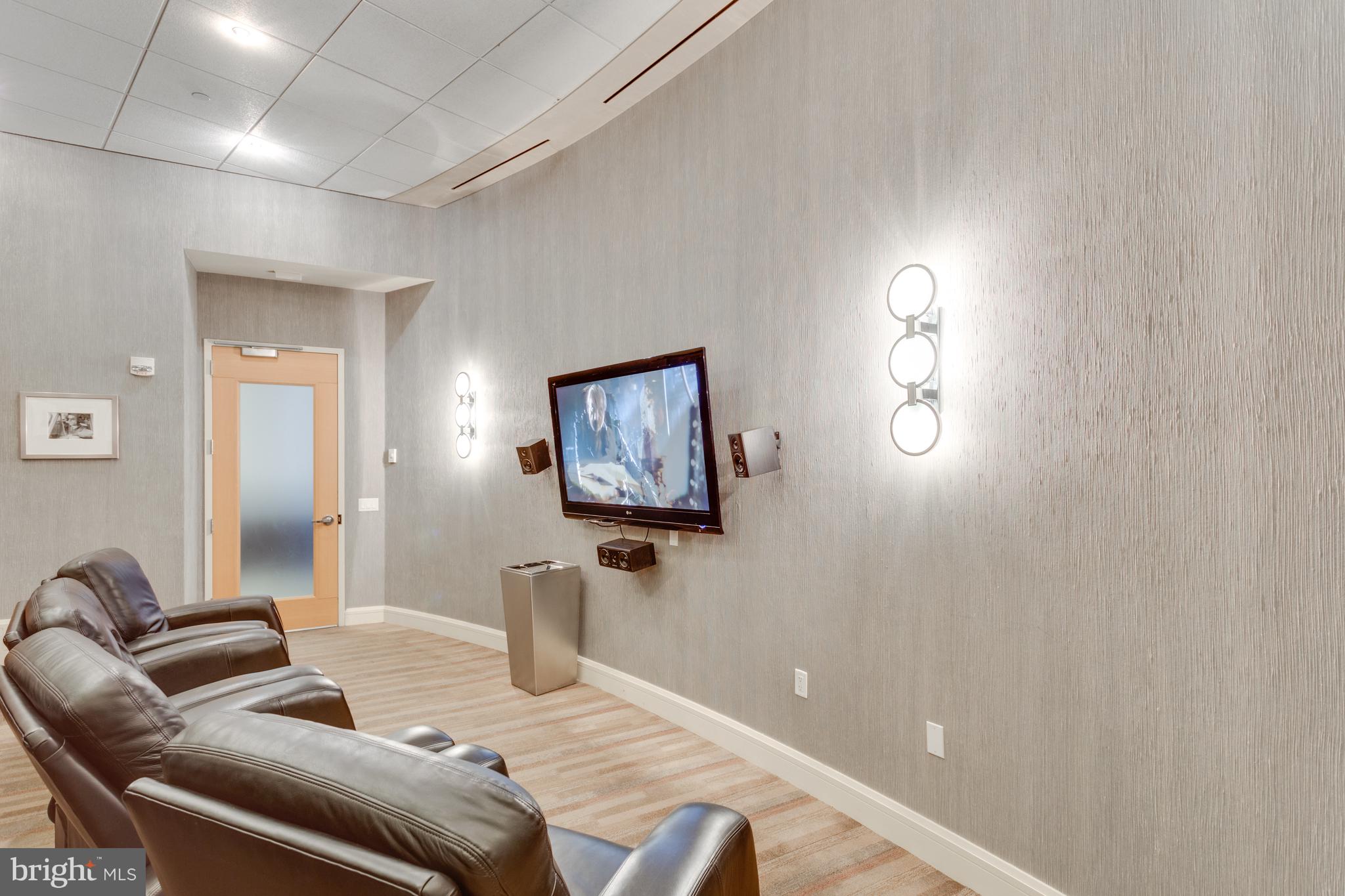 1881 North Nash Street, Unit 1706 Arlington, VA 22209 - Photo 34 of 50 a bedroom with furniture and a wooden floor