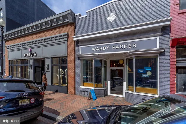 a view of a chairs and table in a patio