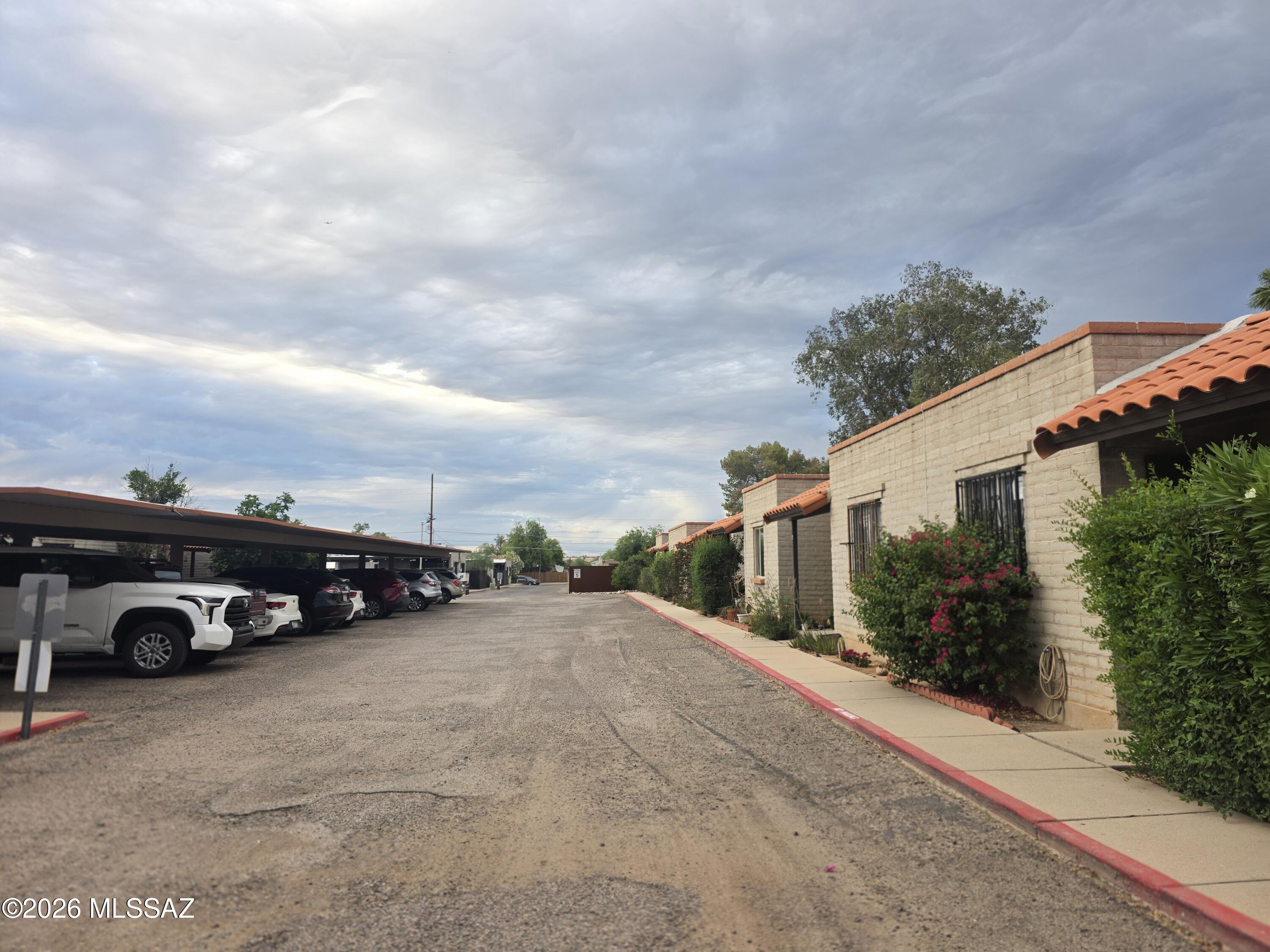 211 West Roger Road, Unit 24 Tucson, AZ 85705 - Photo 24 of 24 front view of a house with car parked