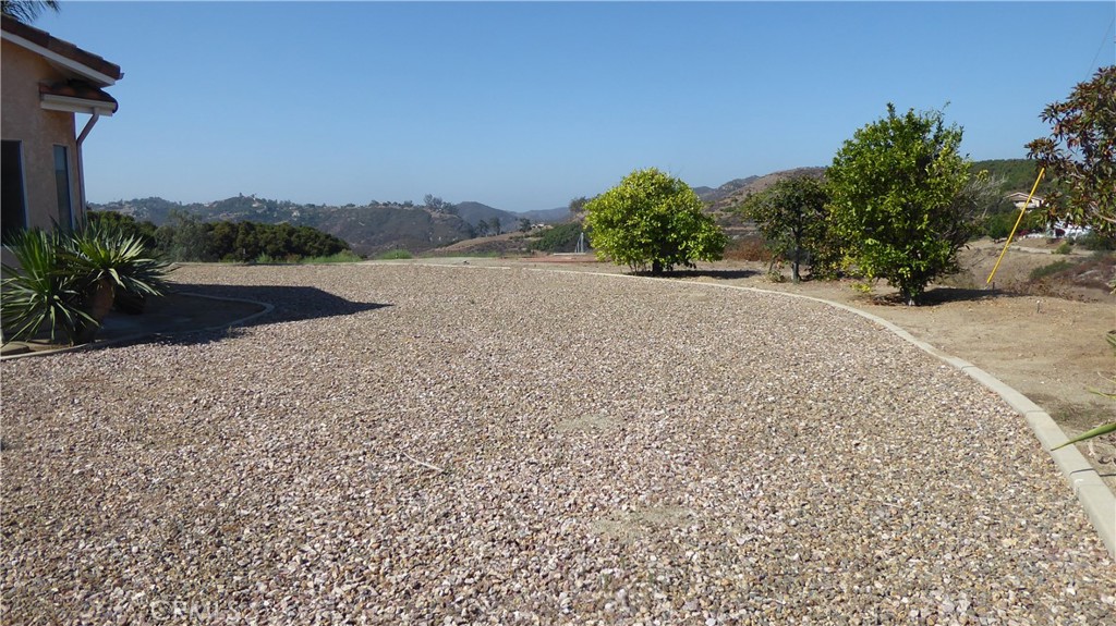 40482 Gavilan Mountain Road Fallbrook, CA 92028 - Photo 16 of 24 Backyard with3 fruit trees and various others