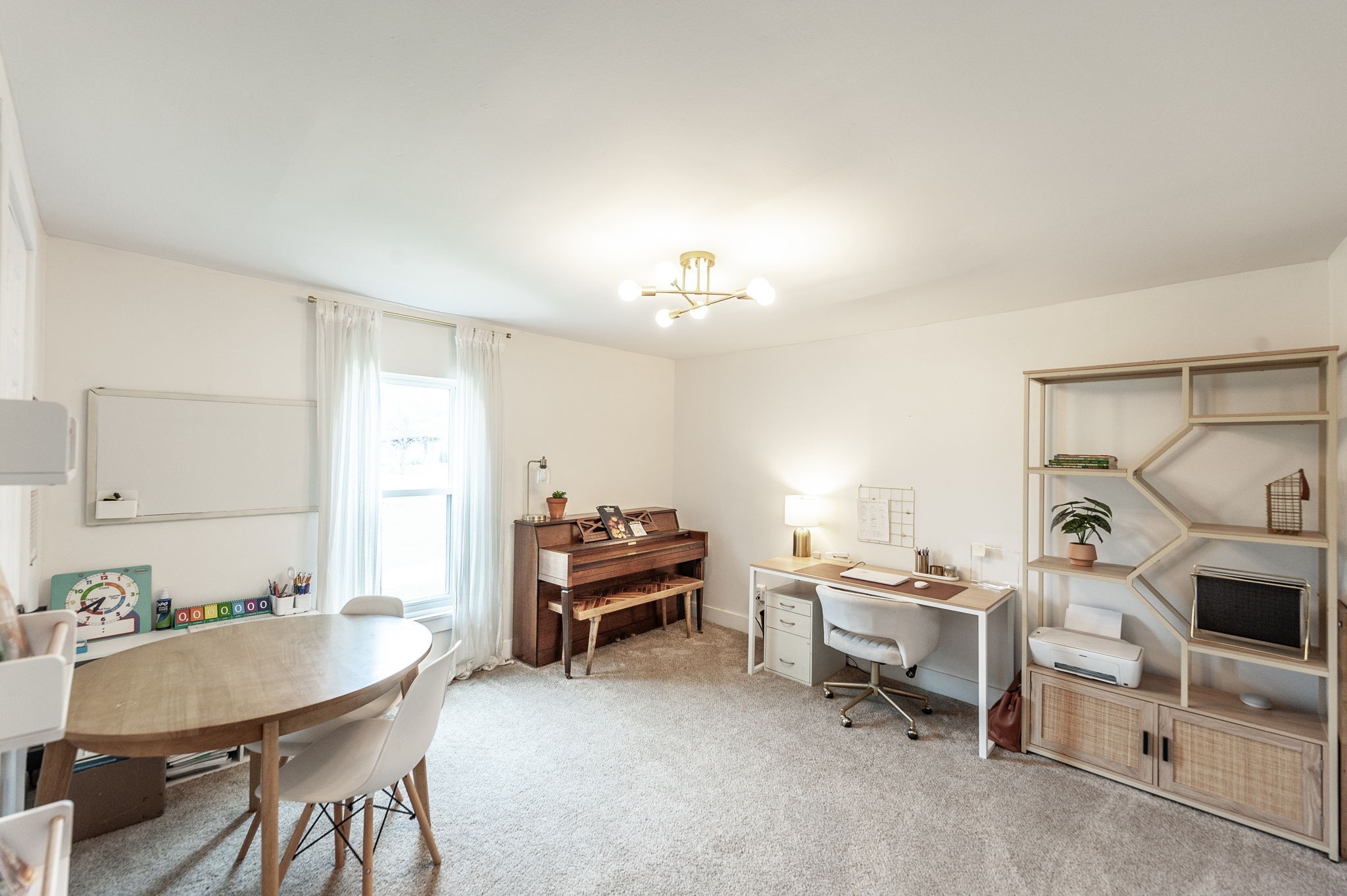 375 Mt Vernon Road Bethpage, TN 37022 - Photo 29 of 66 a living room with furniture and a chandelier