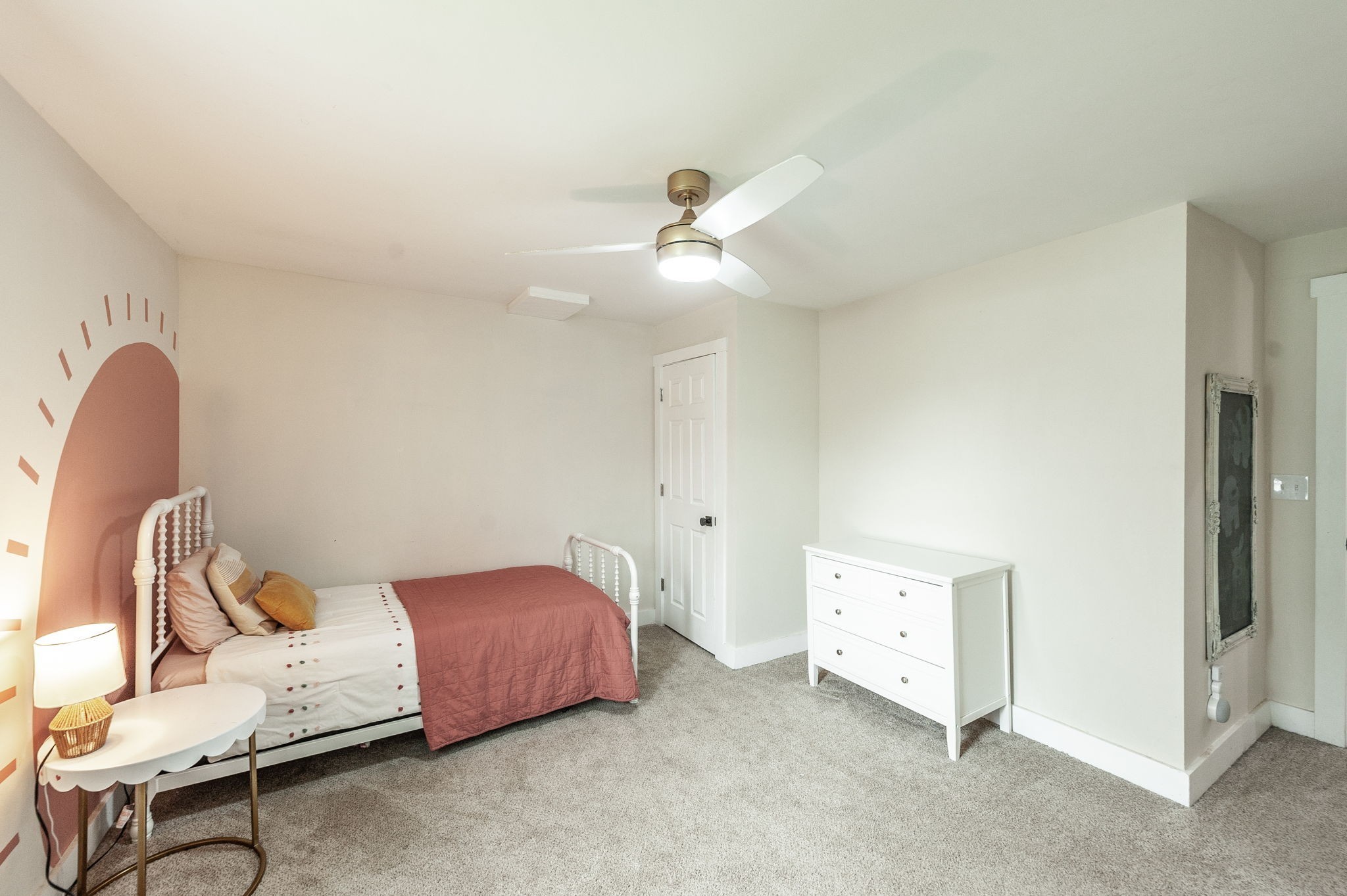 375 Mt Vernon Road Bethpage, TN 37022 - Photo 33 of 66 a bedroom with a bed and a chandelier