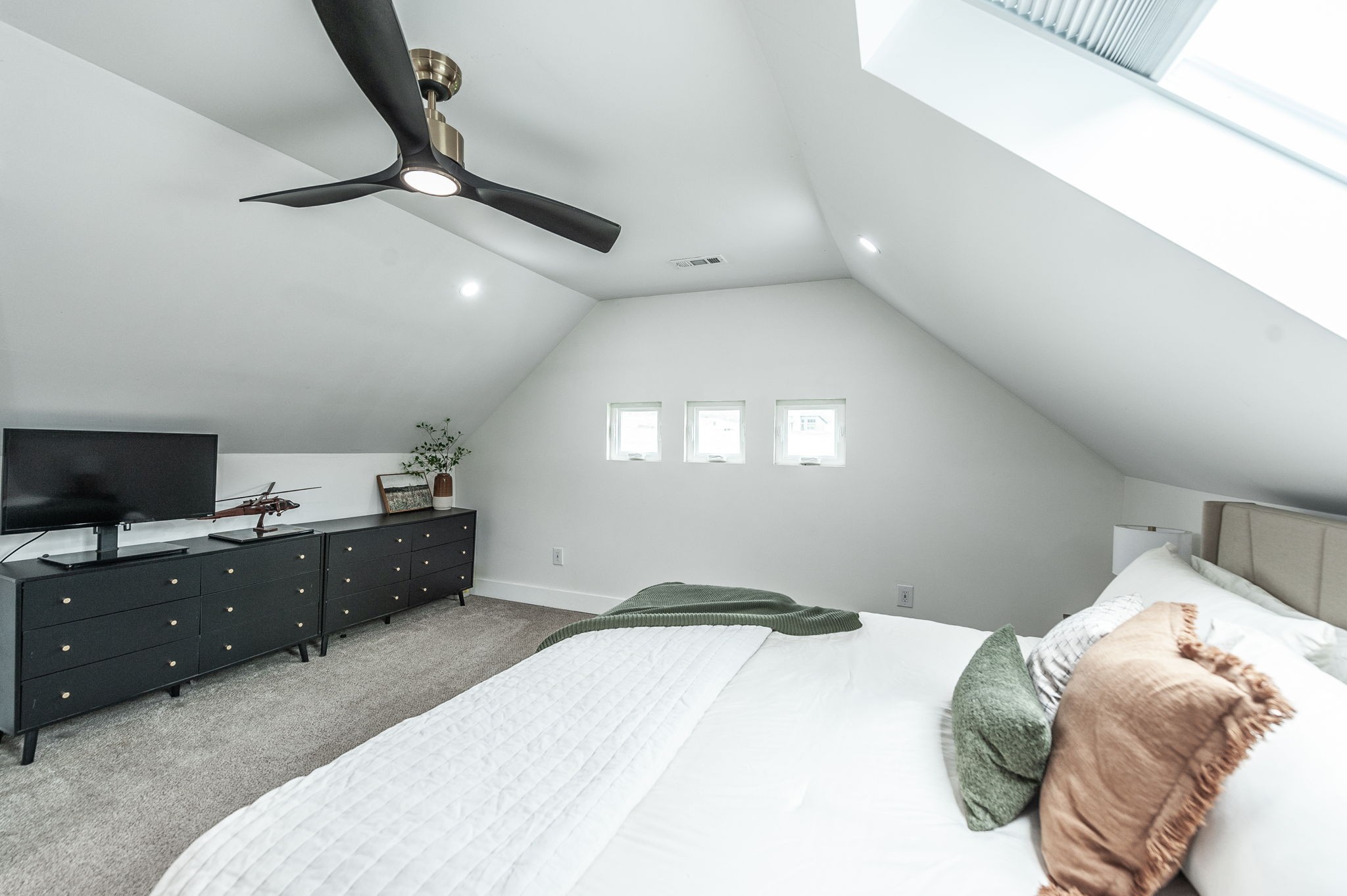 375 Mt Vernon Road Bethpage, TN 37022 - Photo 38 of 66 a bedroom with a bed and a flat tv screen on the dresser