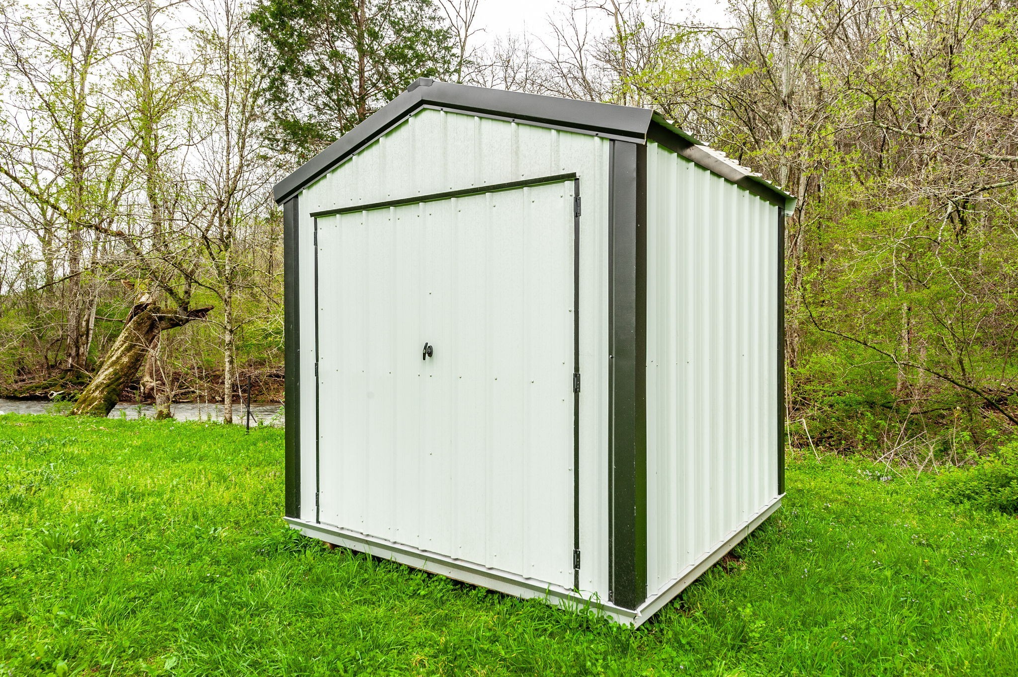 375 Mt Vernon Road Bethpage, TN 37022 - Photo 46 of 66 a view of a small house with a yard