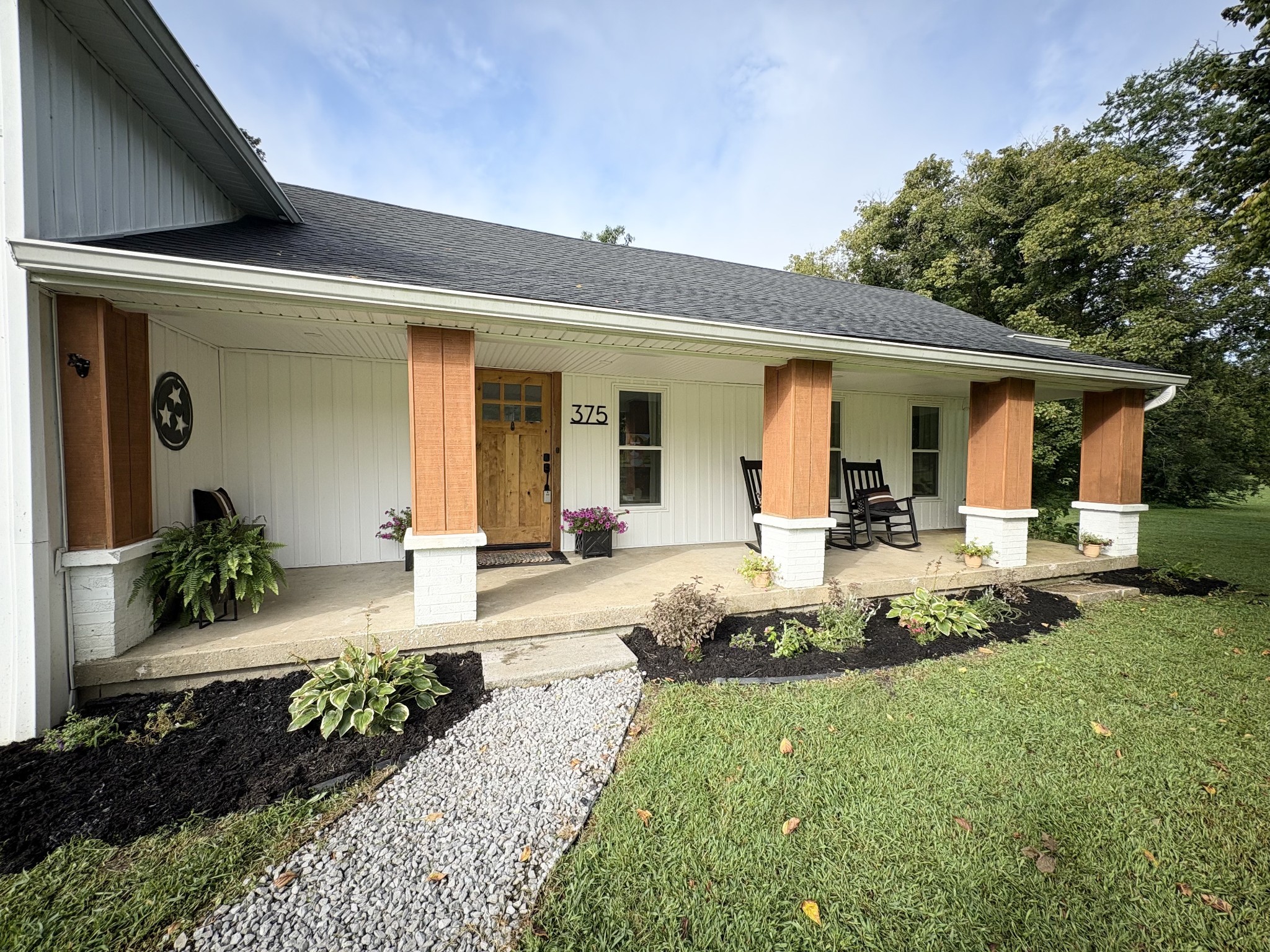 375 Mt Vernon Road Bethpage, TN 37022 - Photo 8 of 66 a front view of a house with a yard