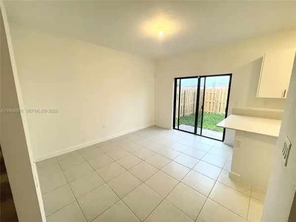 a view of a hallway with a white door
